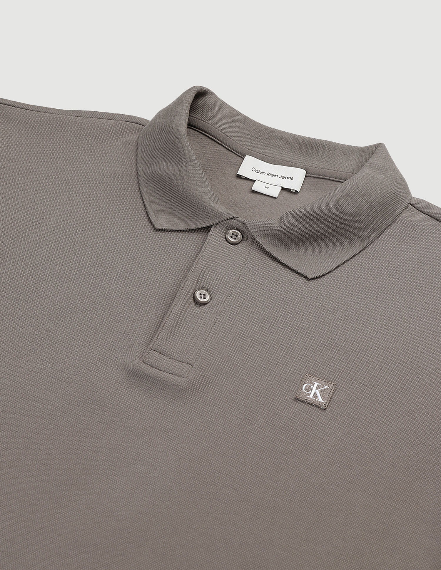 Calvin Klein Solid Badge Logo Polo Shirt
