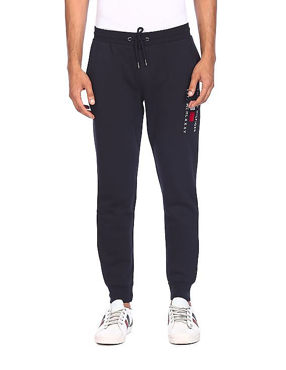 Buy Tommy Hilfiger Men Navy Mid Rise Drawstring Waist Joggers