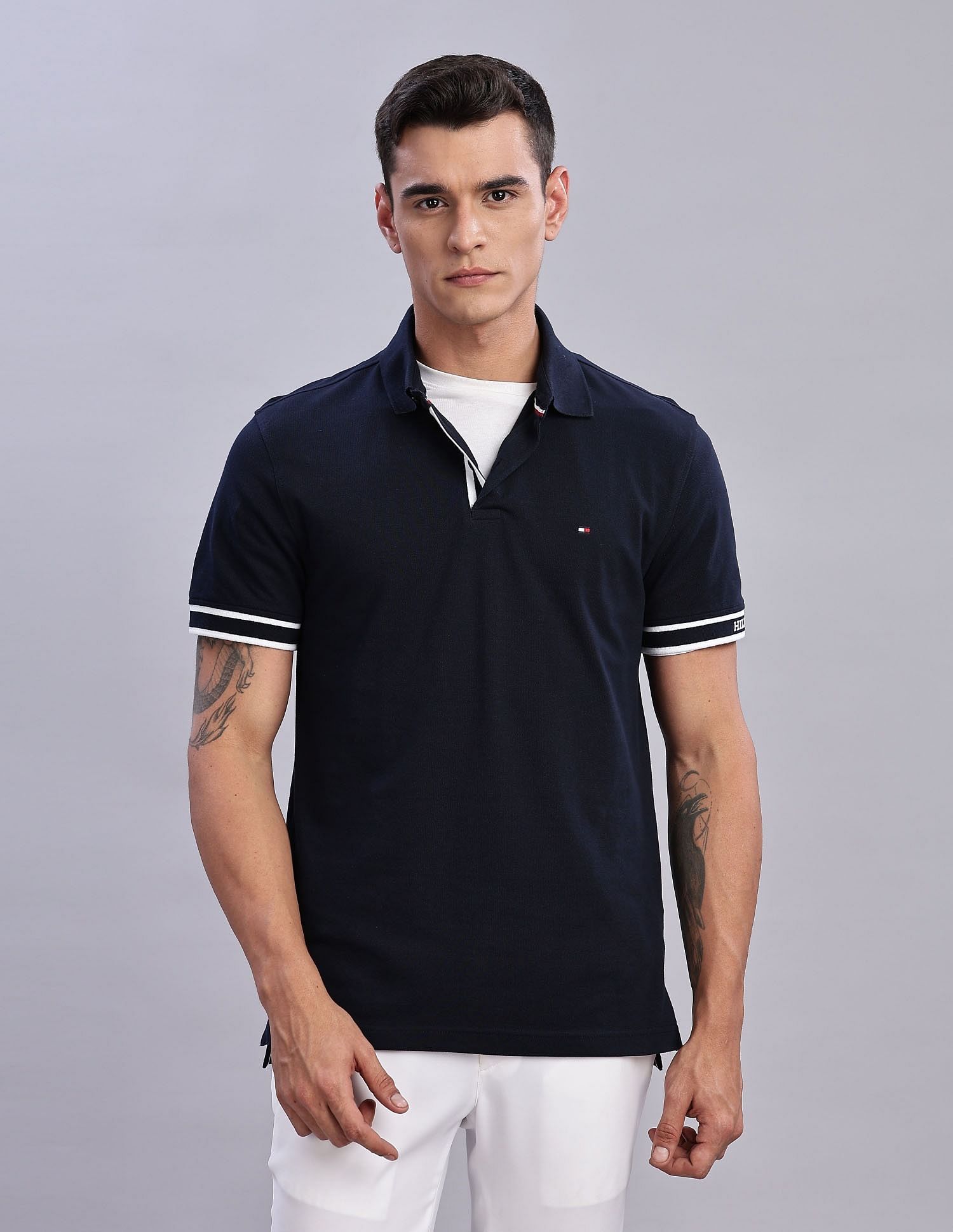 Tommy Hilfiger Mens Blue Solid Polo Shirt