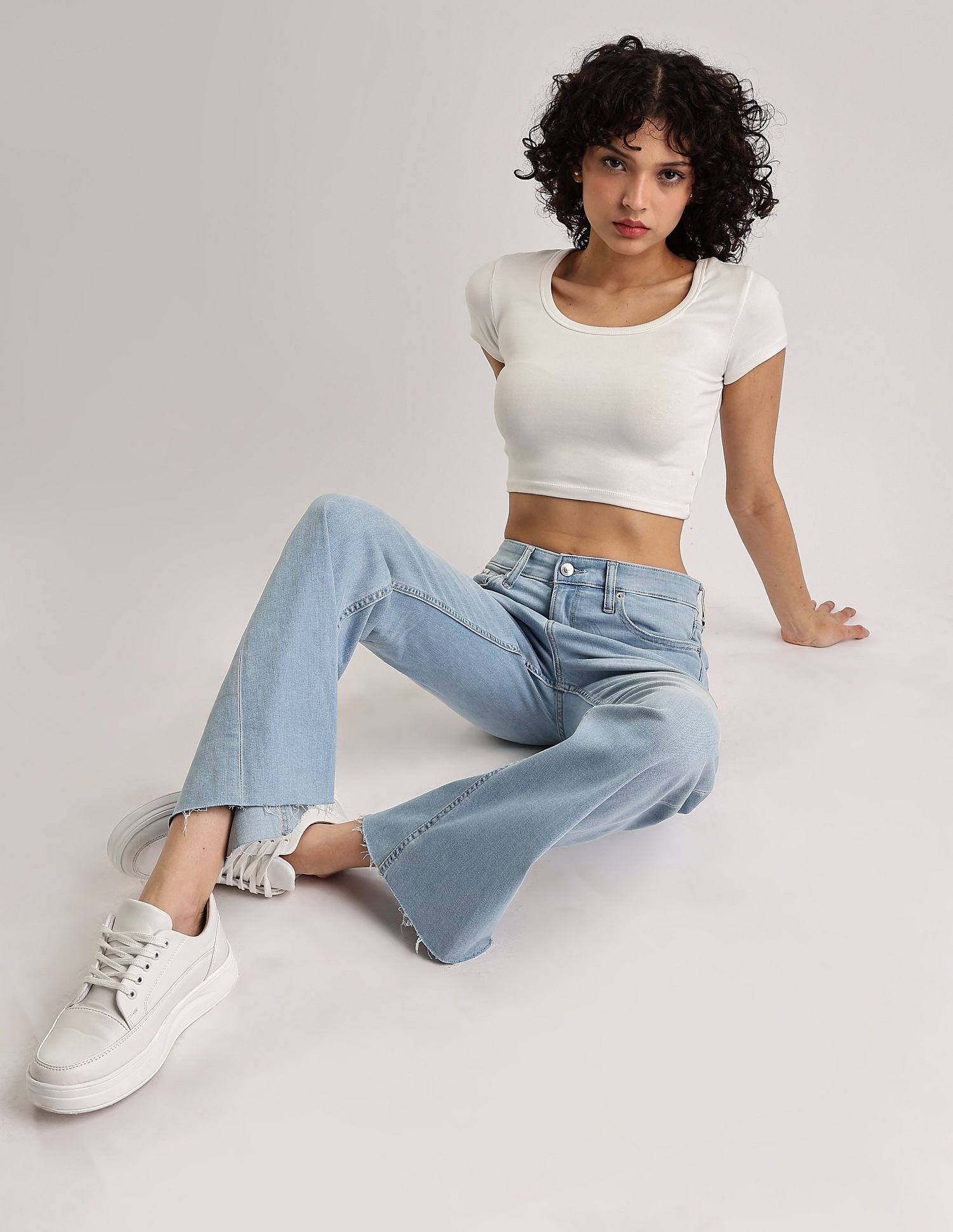 Calvin Klein Jeans Light-Wash Mid Rise Bootcut Jeans
