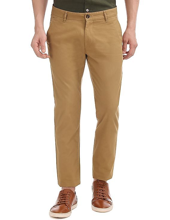Beige Hugo belted pleated cotton-twill trousers | Officine Générale |  MATCHES UK