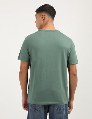 Buy Calvin Klein Jeans Solid Liquid Crew Neck T-Shirt