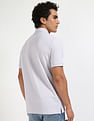 Calvin Klein Jeans Solid Regular-Fit Cotton Polo T-Shirt