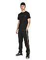 Calvin Klein Jeans Men Black Mid Rise Brand Tape Track Pants