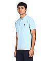 U.S. Polo Assn. Ribbed Collar Solid Polo Shirt