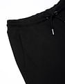 Calvin Klein Jeans Regular-Fit Solid Mid Rise Trouser